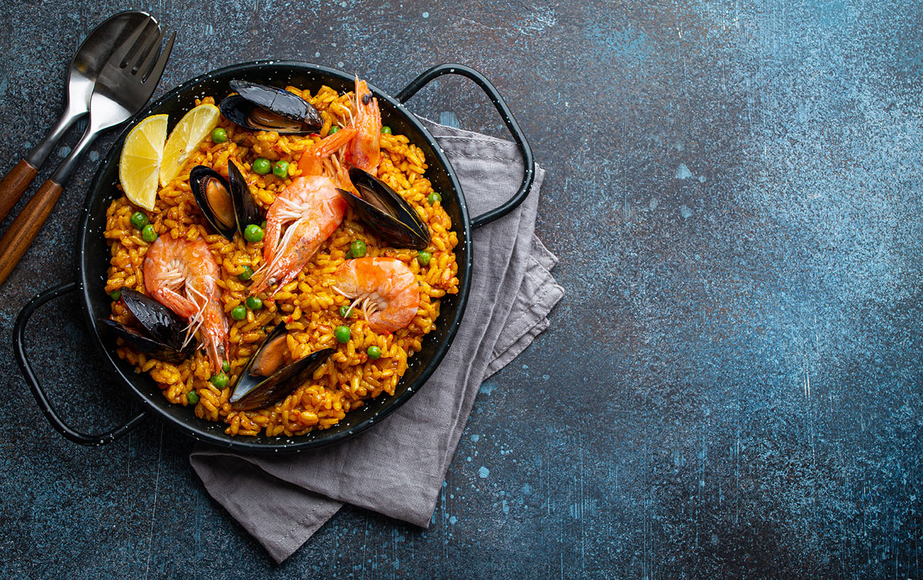 Traditional Spanish paella served with seafood and saffron rice Paella in Spain