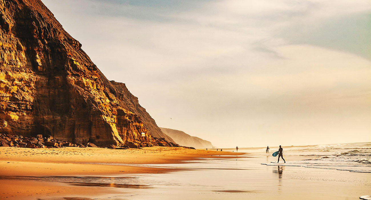 Surfers on the Beach in Ericeira, Portugal