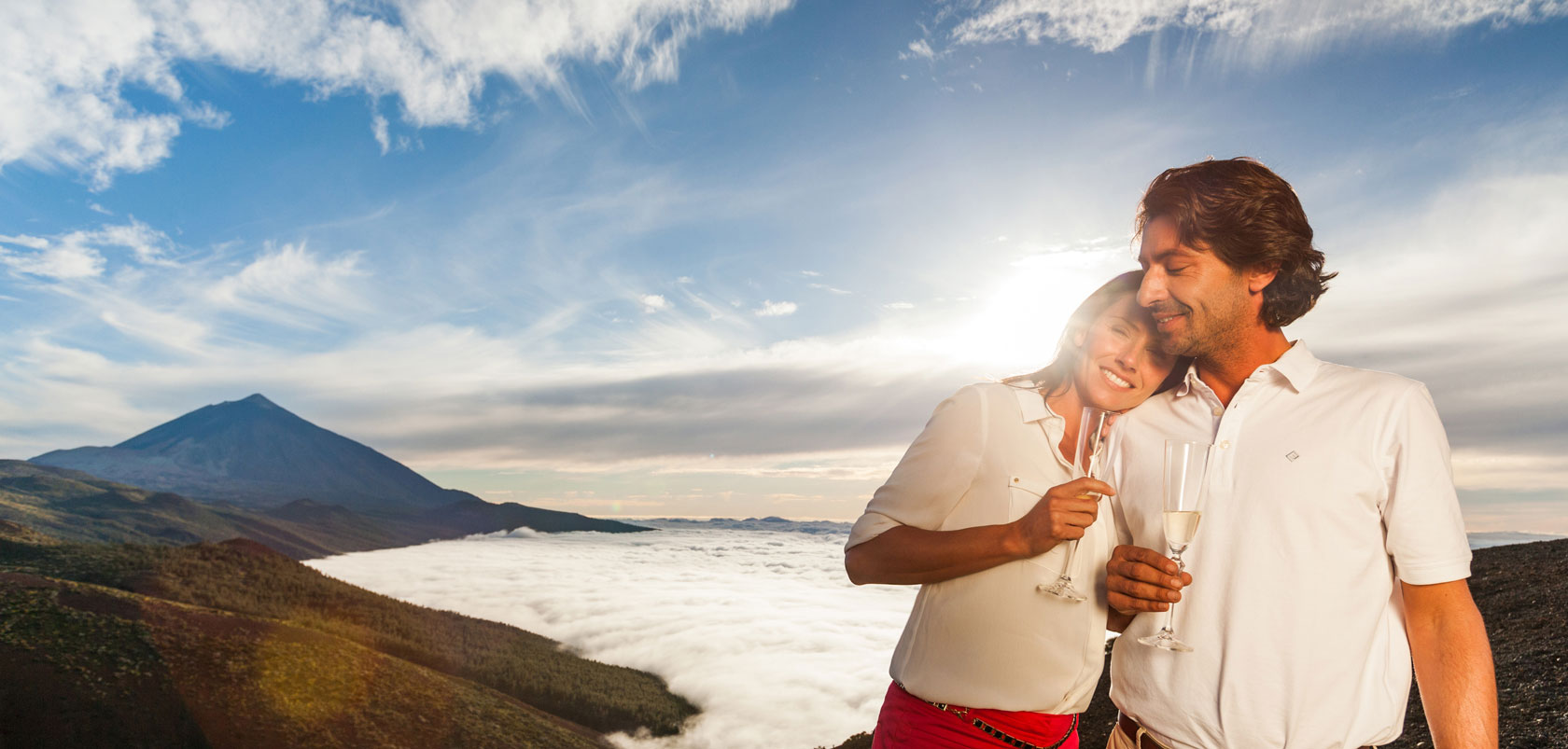 Couple enjoying the views at Mount Teide, Tenerife Couple enjoying Mount Teide