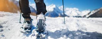 Snowshoeing on a mountain trail
